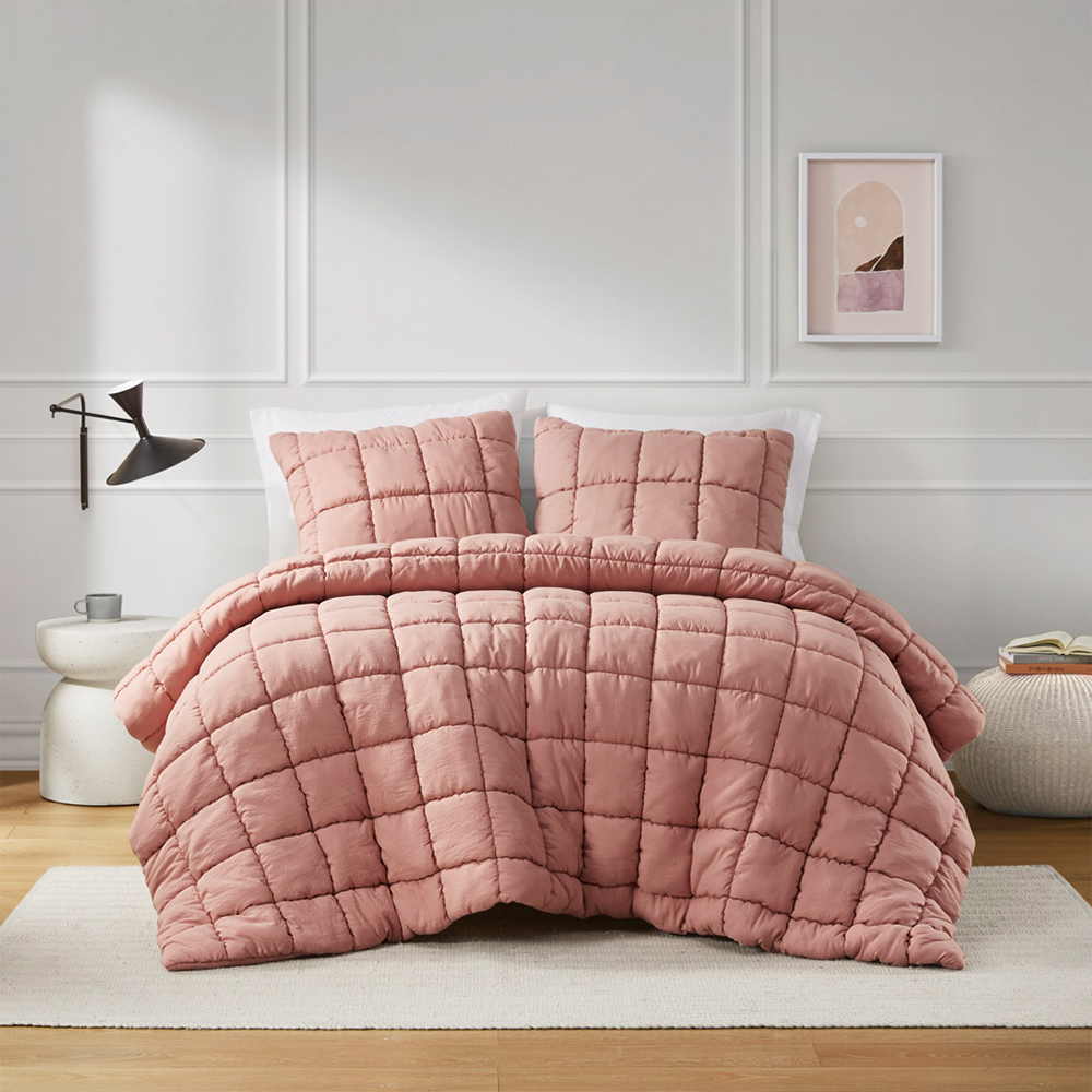 Set piumino gonfio trapuntato con pom pom a griglia Miya