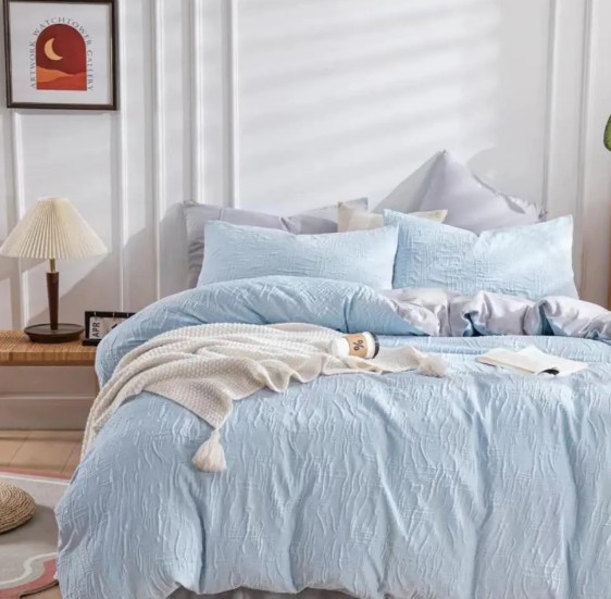 Quale stile di camera da letto è più adatto per un set copripiumino in stile moderno in tinta unita testurizzato Nadine?